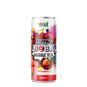 Canette de Vinut Popping Boba Bubble Tea Fraise 320 ml avec perles de boba et fraises fraîches sur fond coloré.